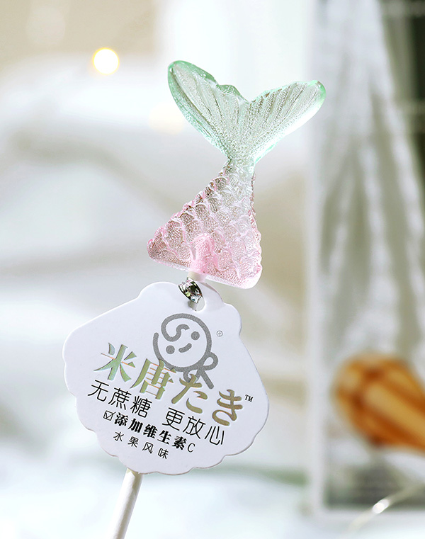 米唐たき海洋小分隊棒棒糖-魚尾漸變白桃味.jpg
